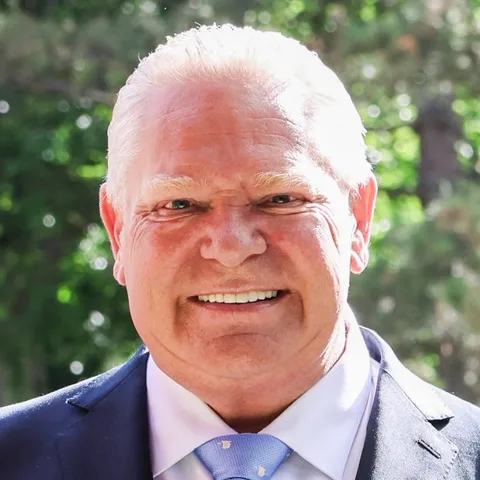 Doug Ford, smiling, outdoors in 2026