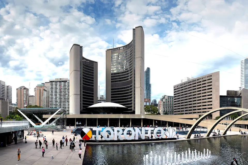 Toronto City Hall and Nathan Phillips Square, with the Toronto sign and the fountain